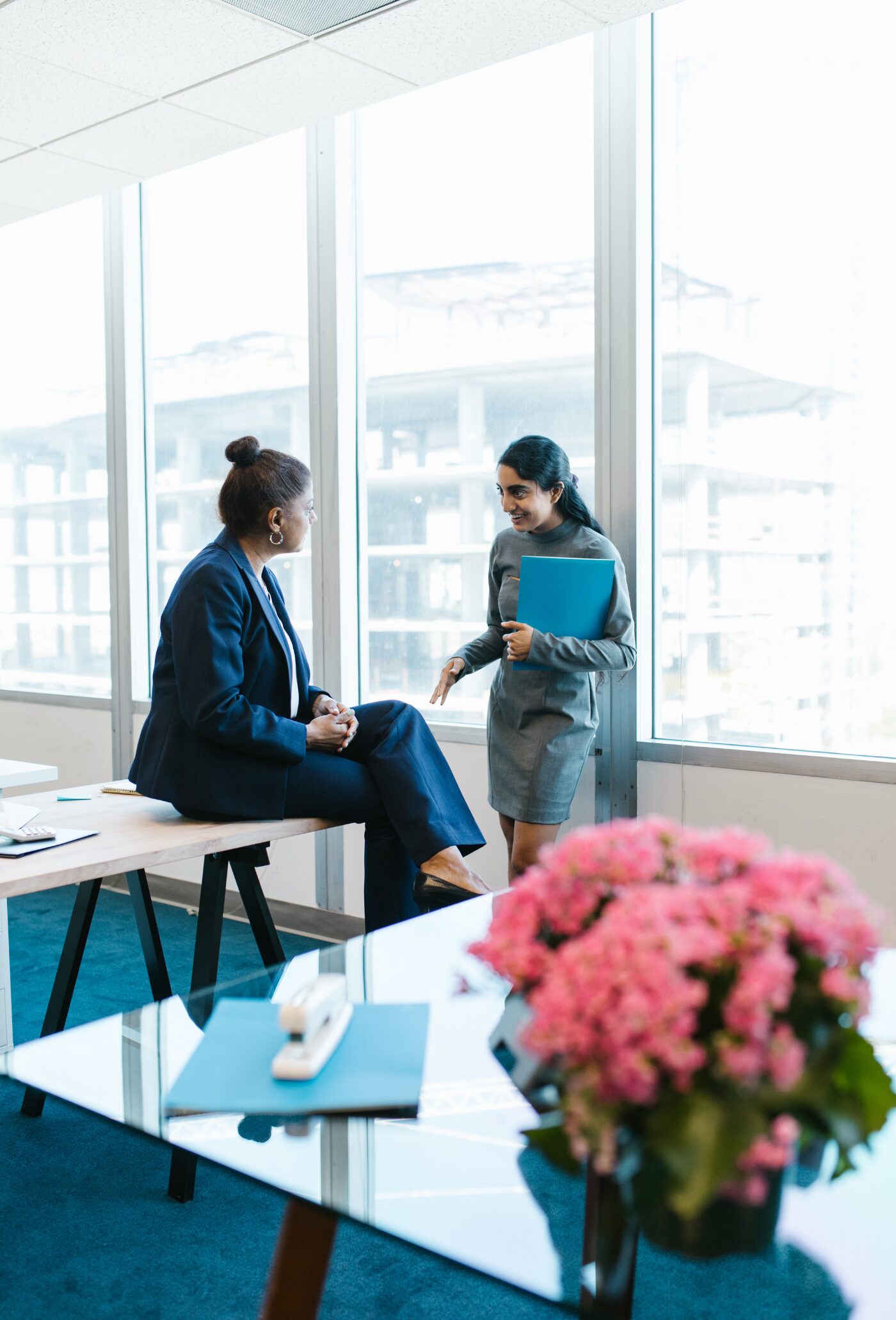 Two Business Women Talking